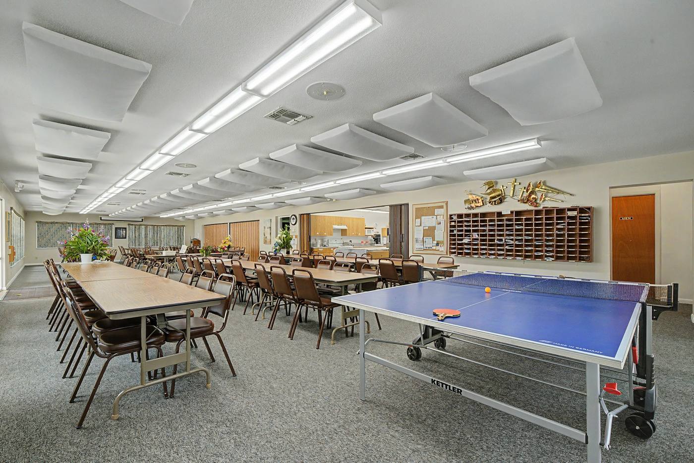 Ping-pong table and resident mail slots in the hall